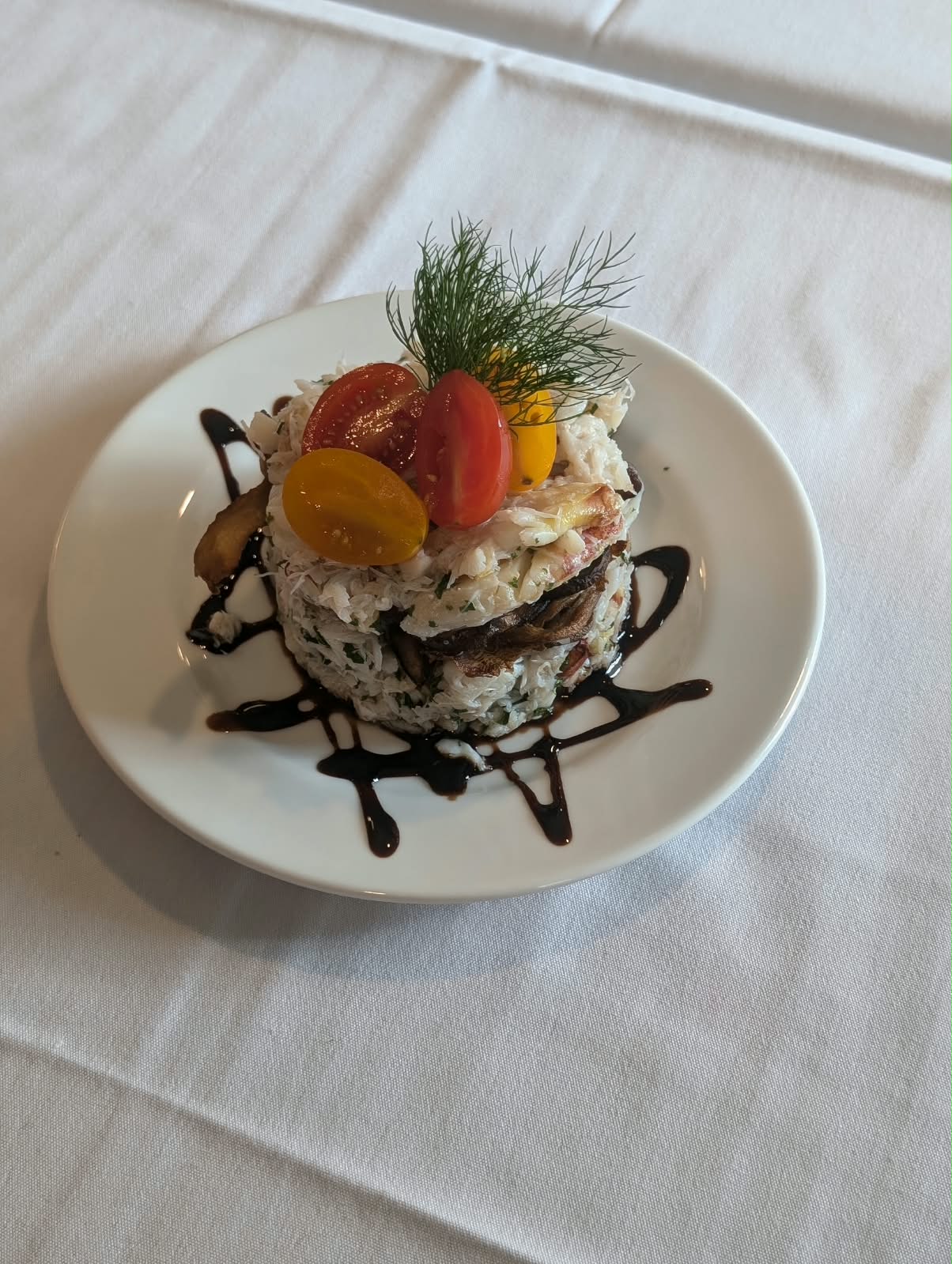 Lump crab with herbs, roasted mushrooms, heirloom tomatoes and dill