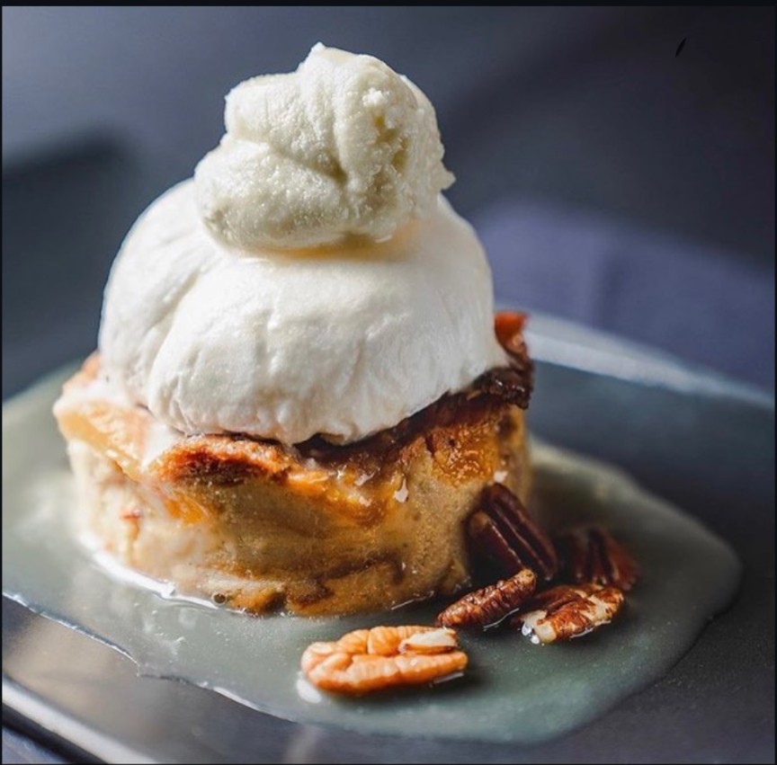 Bread pudding with vanilla ice cream and pecans